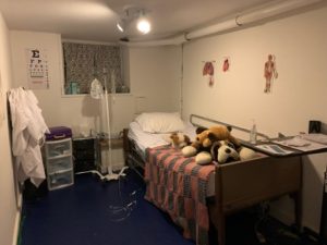 This is a hospital room. Although this room may seem unsettling for some, many kids in the program love to “play doctor” or “hospital.” Some of the kids comfort in this room because a hospital setting might be the only place they remember seeing their loved one, especially if they are very young. 